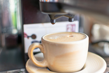 cup of Espresso at the Coffee Machine