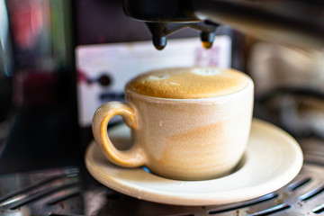 cup of Espresso at the Coffee Machine