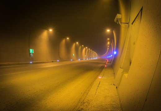 View inside the tunnel with security camera and smoke. Pollution in underground tunnels. Road Kutaisi-Khashuri. 2020