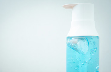 Alcohol gel in bottles for killing the Covid virus 2019. Concept for protecting yourself from germs.