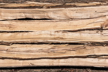 Stack of Split Wood Fence Railing - 332722554