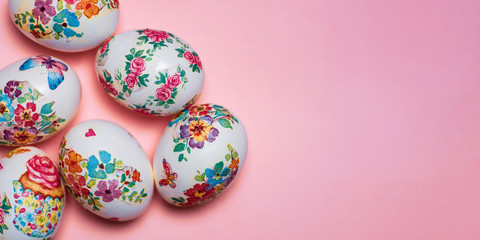 Decoupage decorated Easter eggs with flower pattern