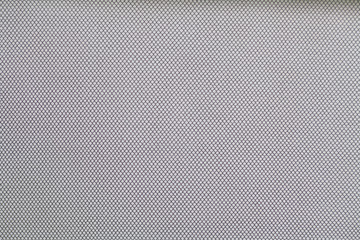 Fine metal mesh against a white background as a texture