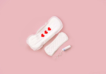Clean pads for periods, tampon, on a light background. The female period of the period.