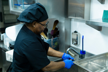 coronavirus.volunteer cooking in hospital kitchen for infected patients