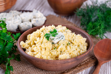 Millet porridge with butter and parsley