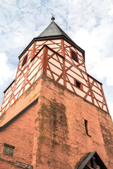Fototapeta na wymiar Tower of the church “Allerheiligen” in Allersberg, Bavaria, Germany