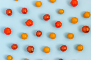 Set fresh vegetables,  tomatoes on a blue background.  Healthy food concept. Flat lay, top view..