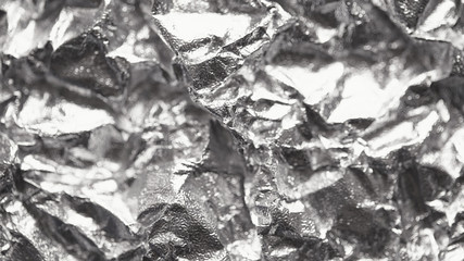 Foil silver crumpled metal aluminum texture background surface decoration backdrop design photo hi-resolution
