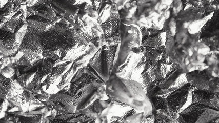 Foil silver crumpled metal aluminum texture background surface decoration backdrop design photo hi-resolution
