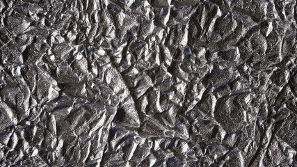 Foil silver crumpled metal aluminum texture background surface decoration backdrop design photo hi-resolution