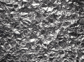 Aluminum crumpled foil, Pattern background with high-resolution design for book cover or brochure, poster, wallpaper or realistic business. Silver texture background, polished metal steel