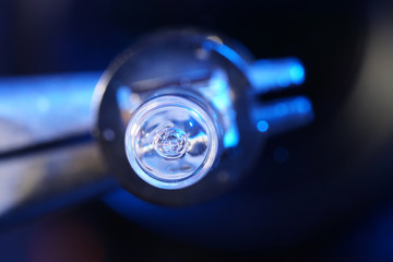 Electric light bulb with smoke photographed in the studio