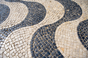 Paving stones in Rio de Janeiro. Black and white paving stones.