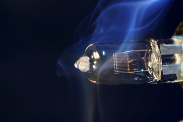 Electric light bulb with smoke 