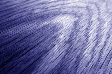 Wooden board texture with blur effect in blue tone.