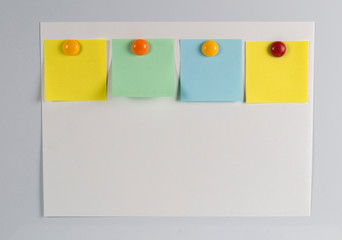 paper post-it notes on a white background