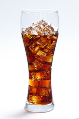 cola with ice cubes on white
