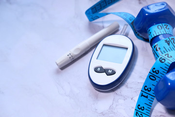  blood sugar measurement for diabetes, dumbbell on white 