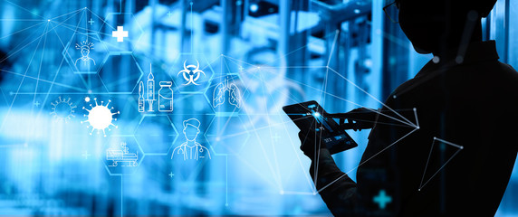 Medical science nurse working with modern computer in the laboratory with a biological AR for analysis and sampling of Covid-19 infectious disease.