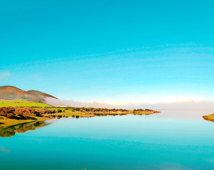 Lake with mountains in Andalusia in a sunny day in the south of Spain