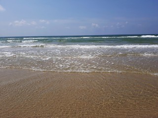 Fototapeta na wymiar Clear water of the Mediterranean Sea, washing the shore of Netanya in Israel.