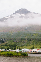 Town of Seydisfjordur nestled at the foot of the mountain 