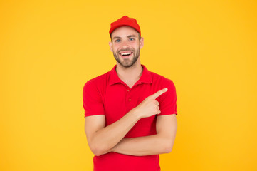 Special offer copy space. Shop worker. Handsome guy cashier. Staff wanted. Supermarket cashier. Man delivery service wear red cap. Shop assistant. Food order delivery man. Cashier occupation