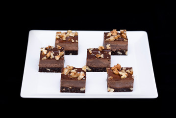 Raw vegan brownie, a healthy and delicious desert gluten-free, no added sugar and deliciously unbaked