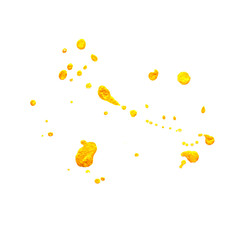 gold spray paint on a white background