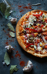 pizza with mushrooms and cheese with spices 