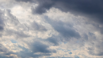 Stormy sky with dark clouds, background for design_