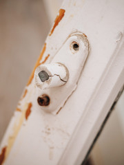 Old dirt rotten wooden retro white window