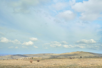 Blue sky over yellow desert. Abstract nature background