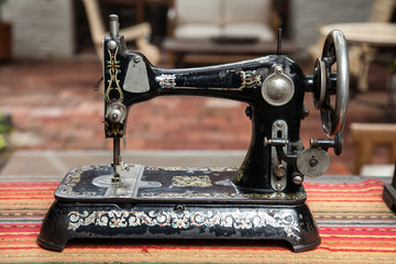 Fashion and manufacturing industry; old sewing machine.