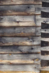 Obraz premium Log house made of old round logs, log texture, rustic style.