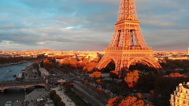 Aerial close up view of Paris Eiffel Tower Tour de Eiffel and panoramic view over Seine River and Paris city attractions at sunset 