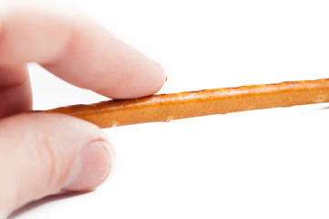 Salty cracker pretzel sticks isolated on white background.Copy space