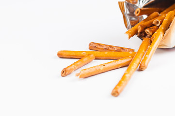 Salty cracker pretzel sticks isolated on white background.Copy space
