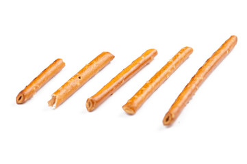 Salty cracker pretzel sticks isolated on white background.Copy space