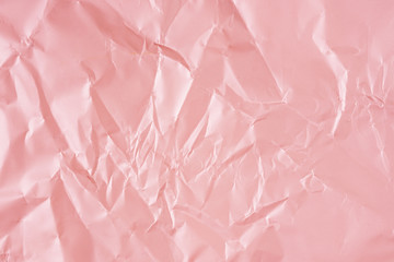 Crumpled pink gold and purple wrapping paper