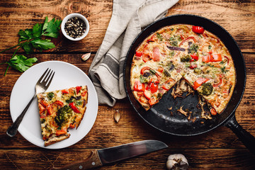 Vegetable frittata with broccoli and red bell pepper