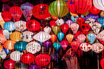 Traditional colorful lanterns spread light on the old street of Hoi An Ancient Town - UNESCO World...