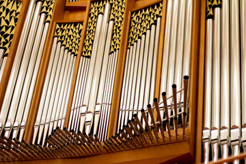 Large organ in the concert hall. Large church organ.