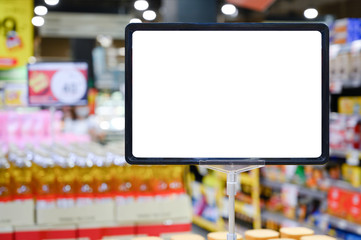 blank board with blur supermarket for background