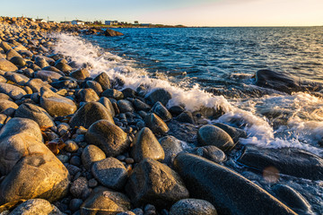 Beautiful coastal sunset scene along the Atlantic Ocean at dusk.