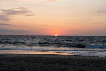 Sunrise breaking the horizon 4