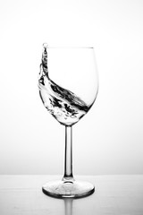 Glass with water up and splash