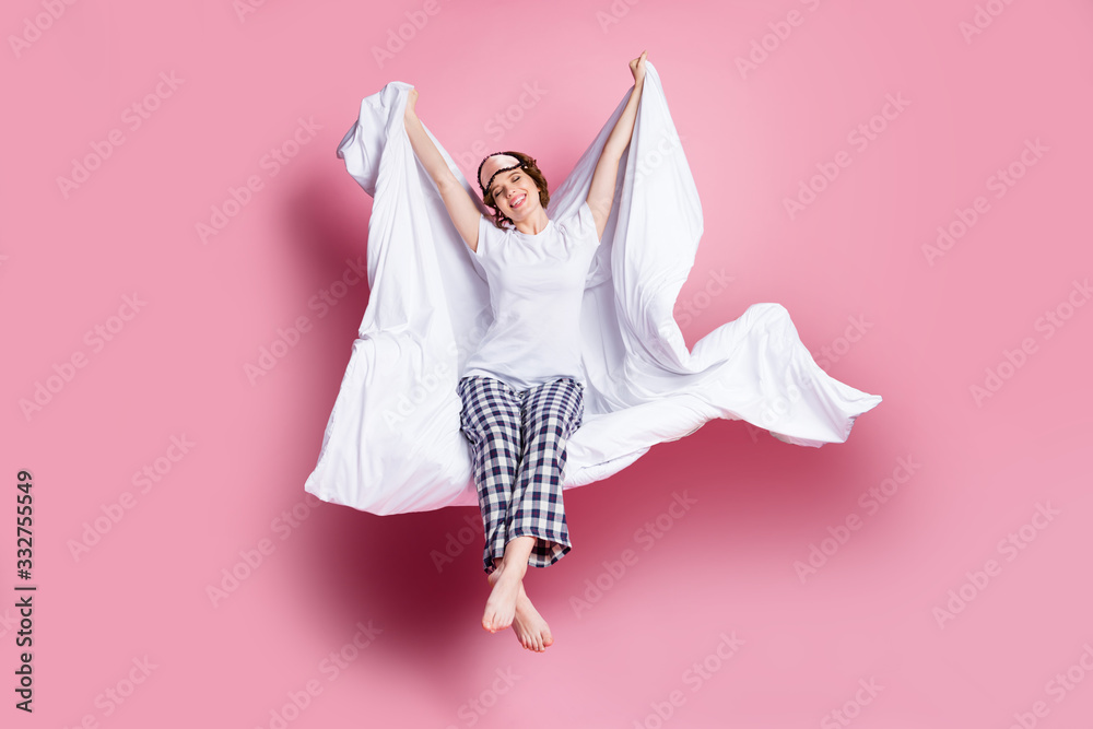 Poster full body photo of funny lady early morning sit bed hold warm blanket under head stretching wear mas