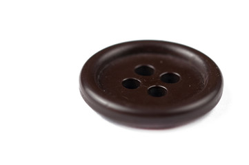 Clothes button isolated on white background. Copy space